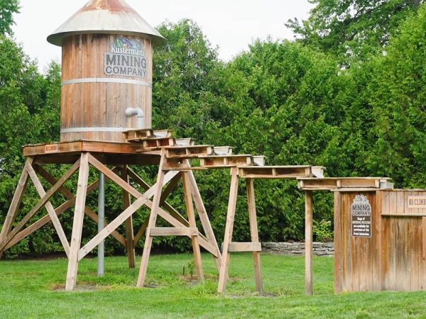 Children sifting sand for gems at the mining attraction at Kustermans Adventure Farm