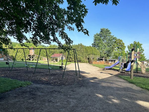 Children playing on the outdoor playground at Kustermans Adventure Farm
